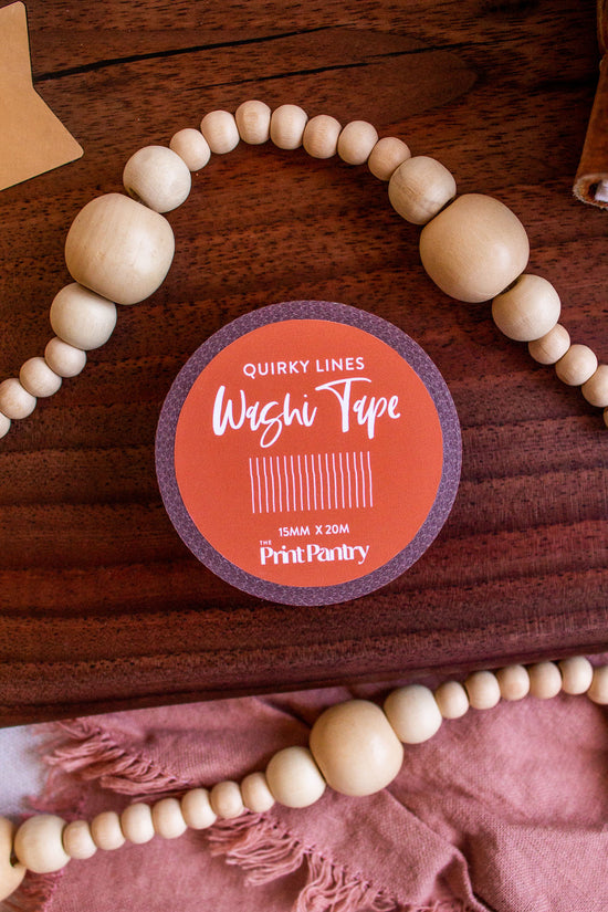 Quirky Lines Washi Tape laying on a decorative wooden tray
