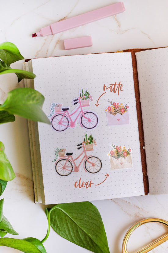 Whimsical Botanical Stickers shown in journal
