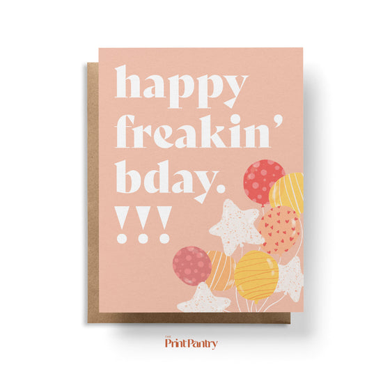 Load image into Gallery viewer, Happy Freakin&amp;#39; Birthday Greeting Card laying on a Kraft paper envelope
