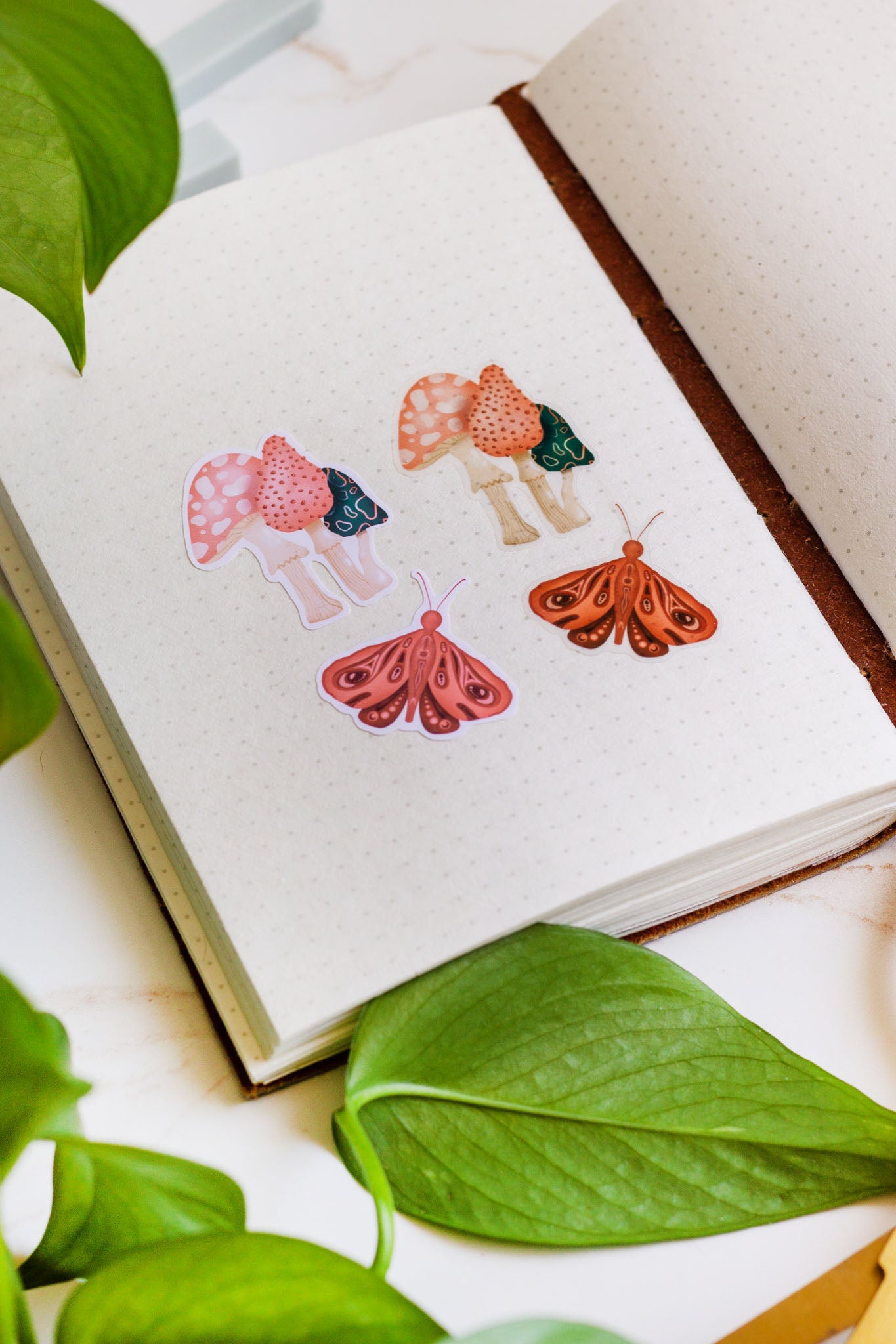 Mushrooms & Moths Stickers in a journal
