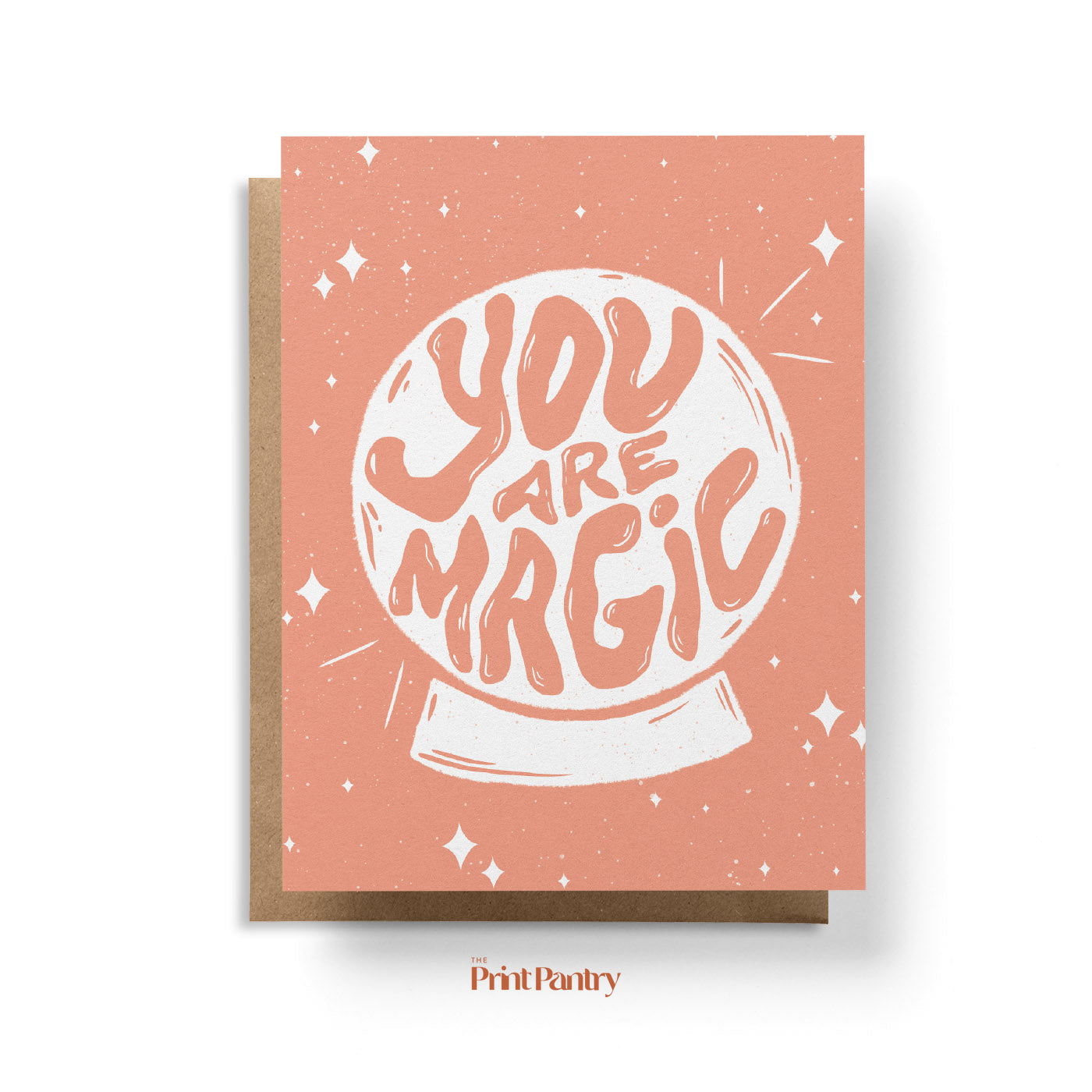You Are Magic Greeting Card laying on a Kraft paper envelope
