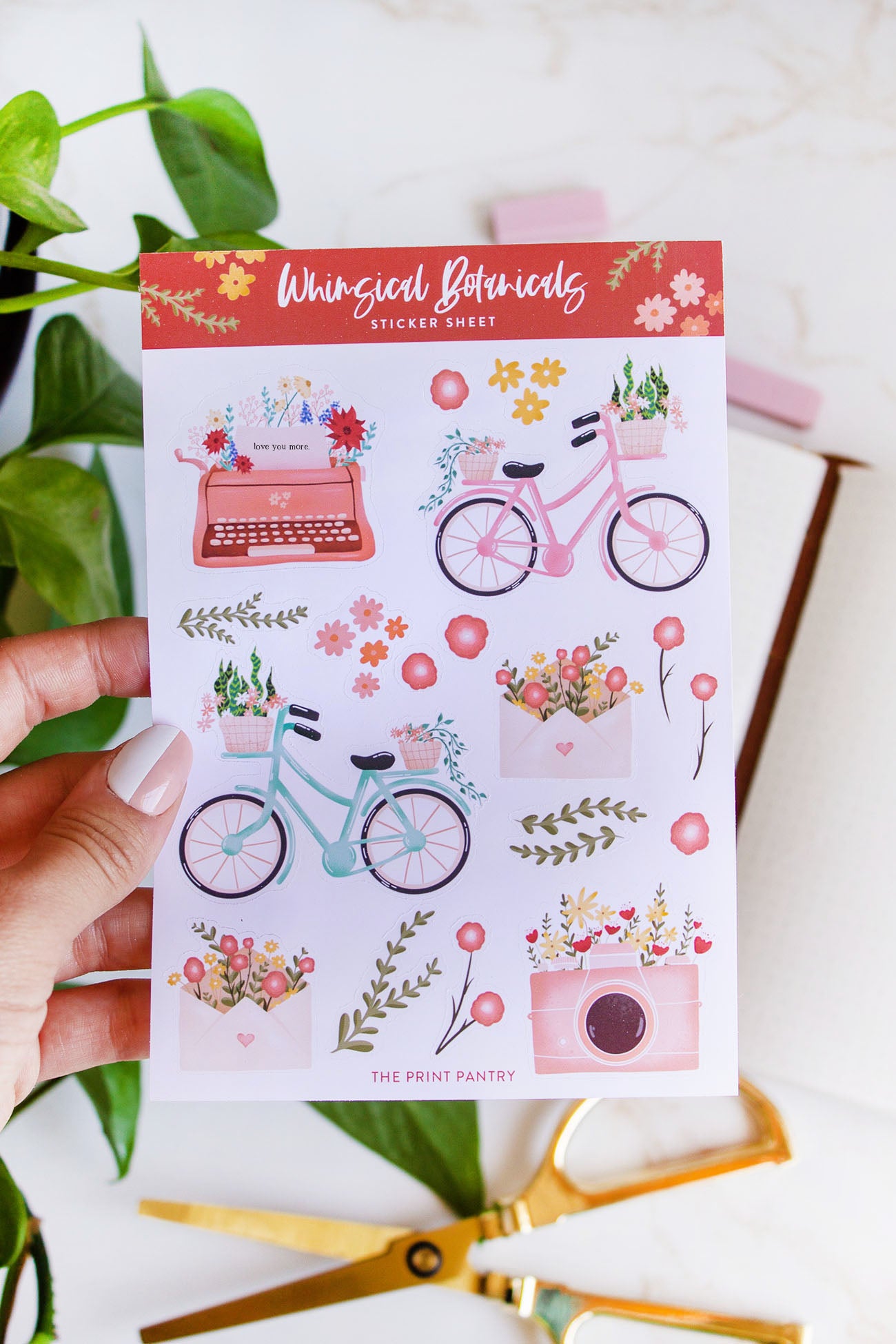 Load image into Gallery viewer, Woman holding a Whimsical Botanical Sticker Sheet
