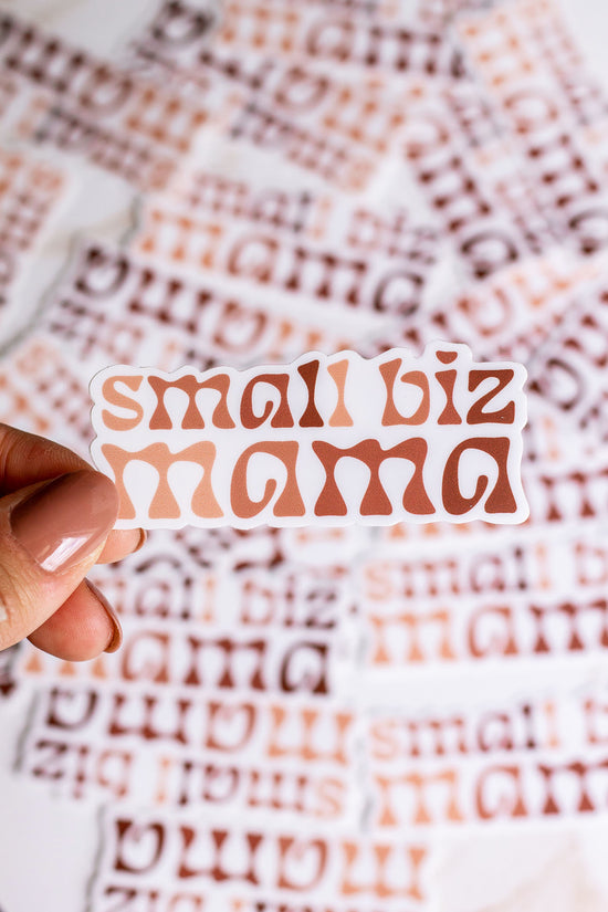 Load image into Gallery viewer, Woman holding a Small Biz Mana Vinyl Sticker

